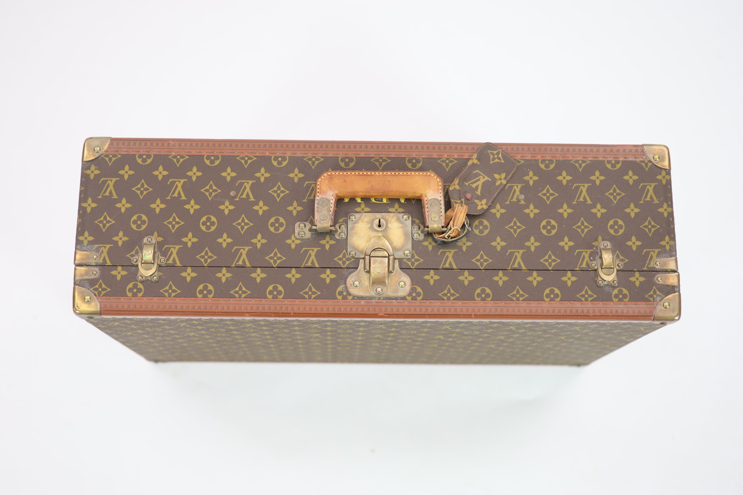 A Louis Vuitton LV pattern suitcase 70 x 47 x 22cm